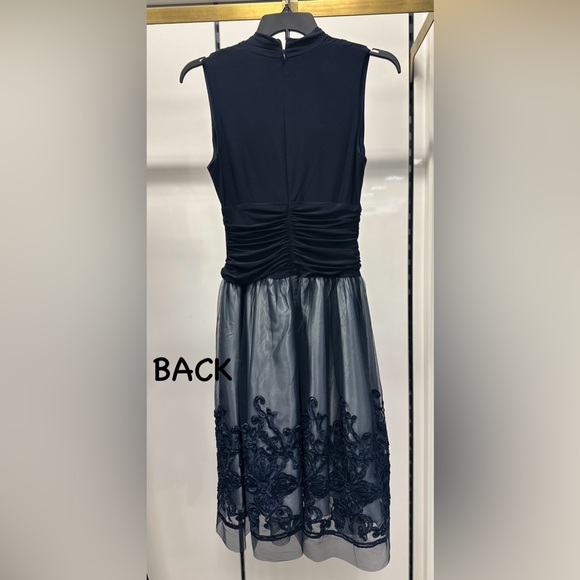 Brand new Beautiful Cocktail Dress in navy with Tulle and navy flowers. Size 12 - Picture 2 of 2